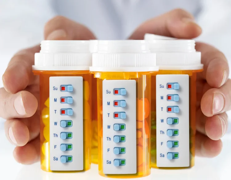 The image displays a medication tracking system, likely designed to help individuals remember if they've taken their daily medication.