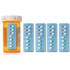 The image displays a "5 count package" of blue Take-n-Slide Medication Trackers, which are designed to attach to pill bottles. On the left, an orange pill bottle has one white Take-n-Slide tracker attached to its side. This tracker is a vertical rectangle with each day of the week (Su, M, T, W, Th, F, Sa) listed, accompanied by a small horizontal slider. These sliders can reveal either a red square (indicating medication not taken) or a green square (indicating medication taken). On the pill bottle, the tracker shows the top three days (Sunday, Monday, Tuesday) with red squares, while the remaining days (Wednesday through Saturday) have green squares. To the right, four more identical white Take-n-Slide trackers are shown, arranged vertically. These trackers also display the days of the week and the red/green sliders. It appears all the sliders on these four trackers are in the "red" position, suggesting they are unused or reset. Part of a fifth tracker is visible on the far right edge of the image, implying the "5 count package".