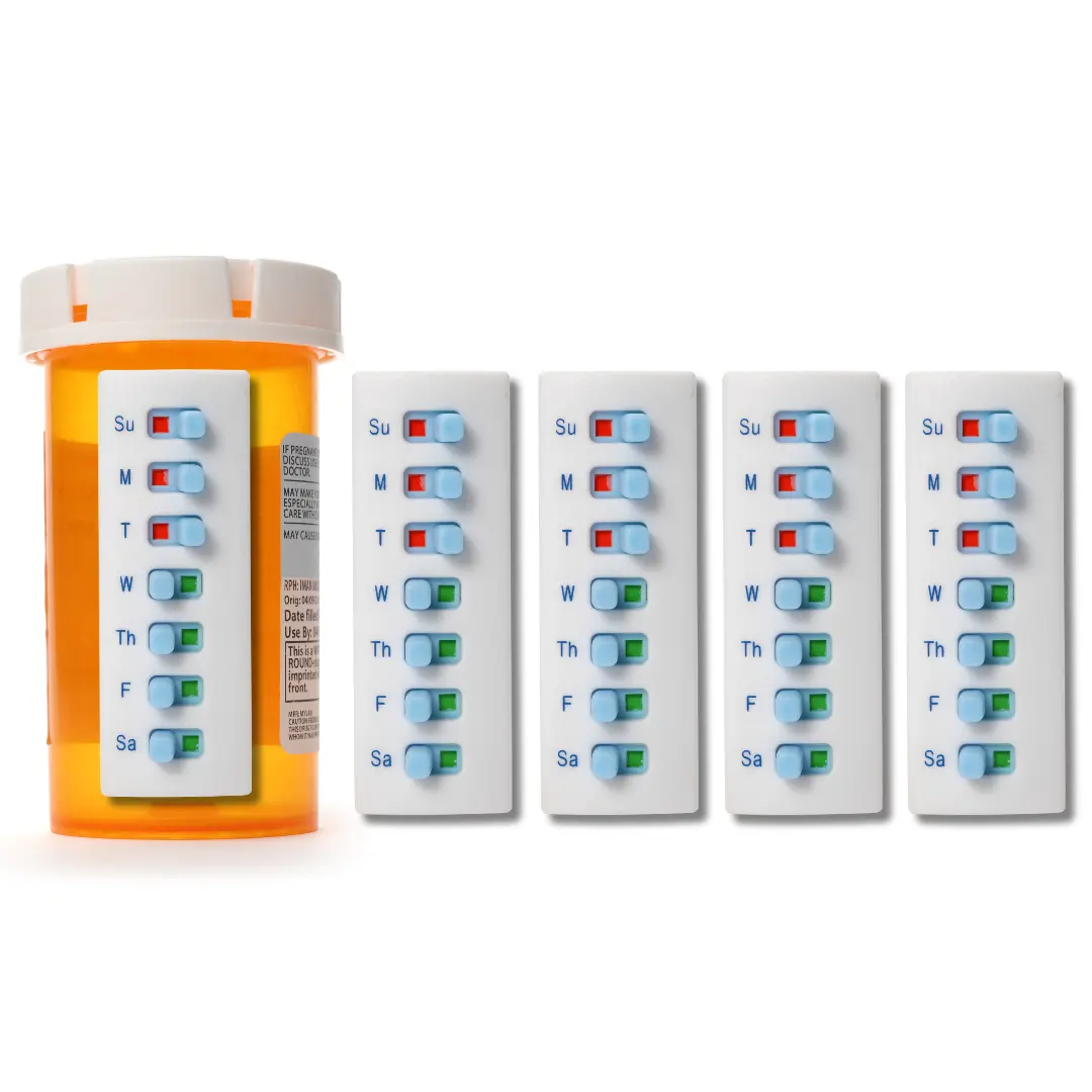 The image displays a "5 count package" of Take-n-Slide Medication Trackers. On the left, an orange pill bottle has one white Take-n-Slide tracker attached to its side. This tracker is a vertical rectangle with each day of the week (Su, M, T, W, Th, F, Sa) listed, accompanied by a small horizontal slider. These sliders can reveal either a red square (indicating medication not taken) or a green square (indicating medication taken). On the pill bottle, the tracker shows the top three days (Sunday, Monday, Tuesday) with red squares, while the remaining days (Wednesday through Saturday) have green squares. To the right, four more identical white Take-n-Slide trackers are shown, arranged vertically. These trackers also display the days of the week and the red/green sliders. It appears all the sliders on these four trackers are in the "red" position, suggesting they are unused or reset. Part of a fifth tracker is visible on the far right edge of the image, implying the "5 count package".